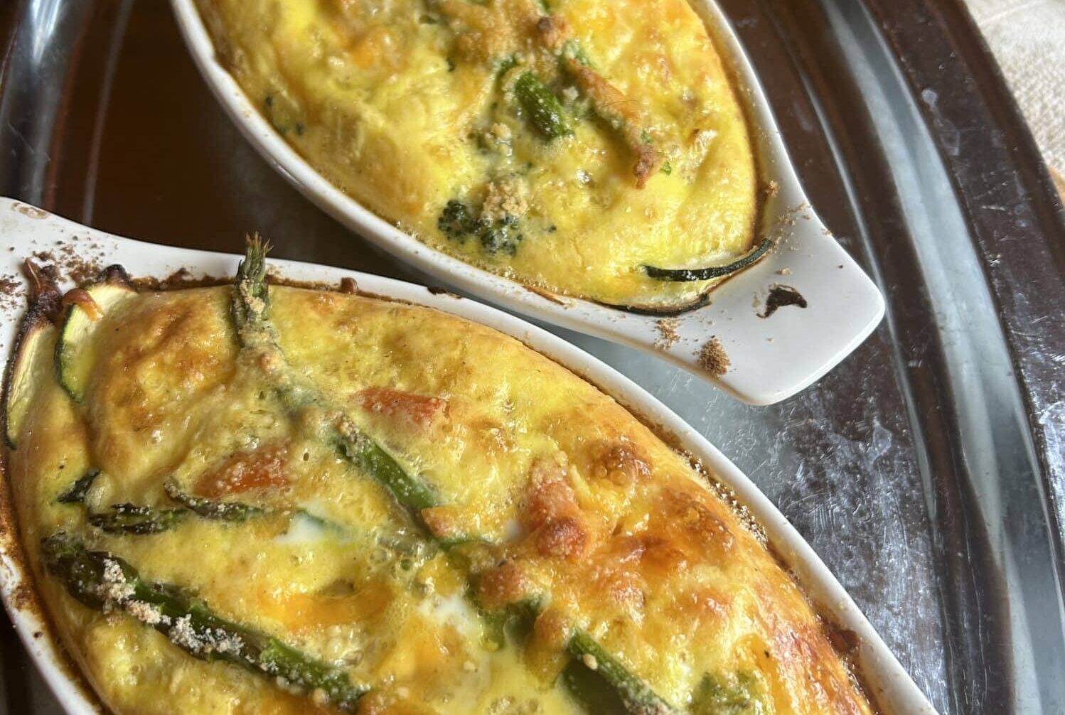 Baked vegetable frittatas fresh out of the oven.
