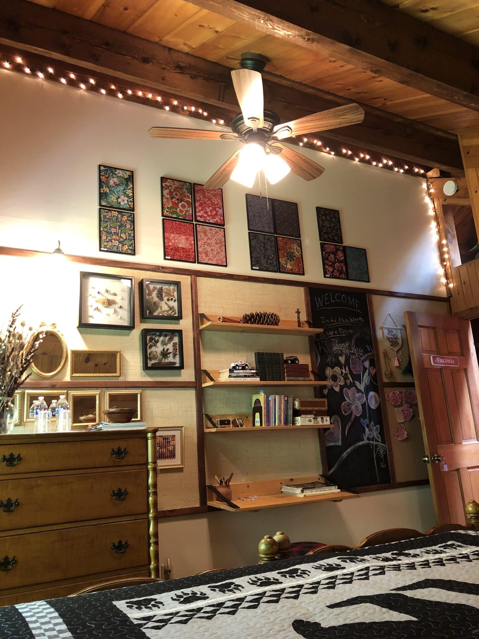 The Taconic Room decor wall of interesting items has added several new  to see including framed fabrics for far away places., and twinkle lights.